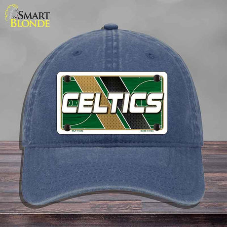 Blue cap with Celtics logo on a gray background