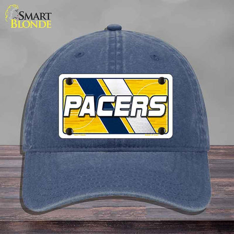 Blue cap with a 'Pacers' logo on a gray background