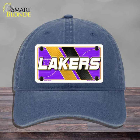 Blue cap with Lakers logo on a gray background