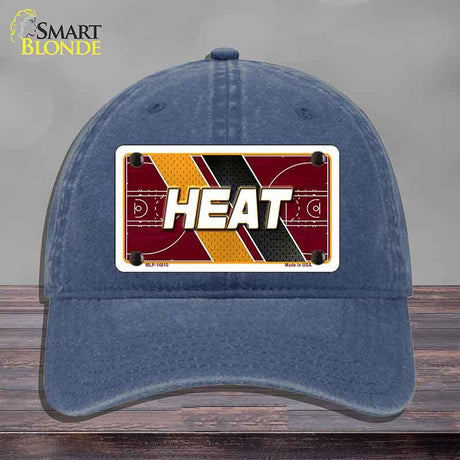 Blue cap with 'HEAT' design on a gray background