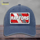 Blue cap with a 'Raptors' logo on a gray background