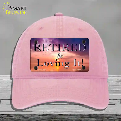 Retired and Loving It Novelty License Plate Hat Unconstructed Cotton / Pink
