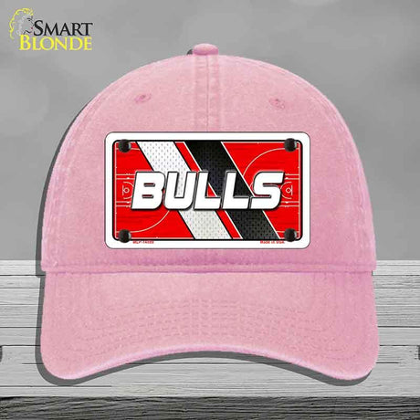 Pink cap with a 'BULLS' logo on a gray background