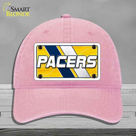 Pink cap with 'Pacers' logo on a gray background