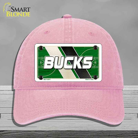 Pink cap with a 'Bucks' license plate design on a gray background