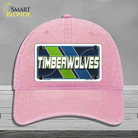 Pink cap with a 'Timberwolves' license plate design on a gray background
