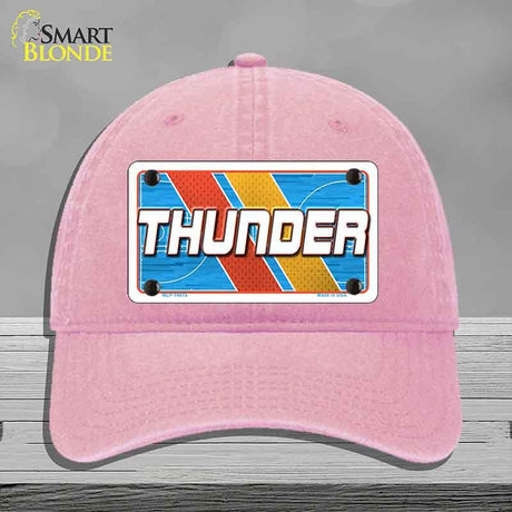 Pink cap with a 'THUNDER' license plate design on a gray background