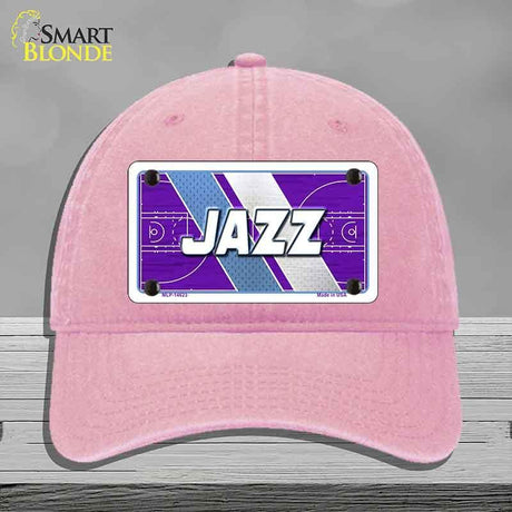 Pink cap with 'JAZZ' design on a gray background