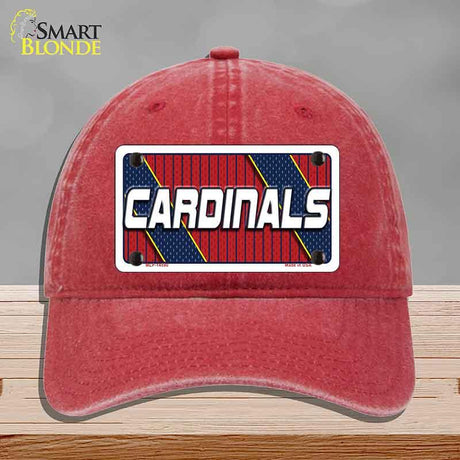 Red cap with 'Cardinals' logo on a gray background