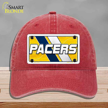 Red cap with a 'Pacers' logo on a gray background