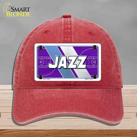 Red cap with 'JAZZ' design on a gray background