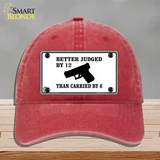 Judged By 12 Carried By 6 Novelty License Plate Hat Unconstructed Cotton / Red