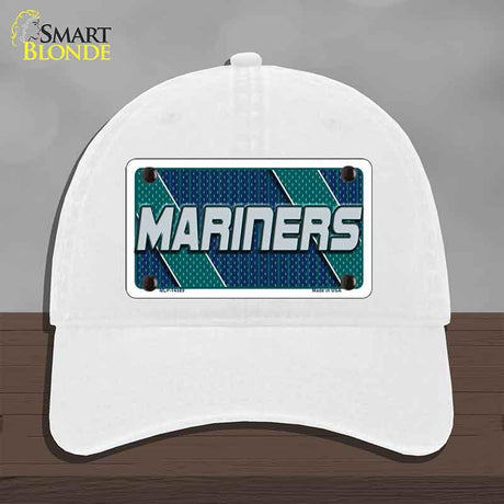 White cap with 'Mariners' logo on a gray background