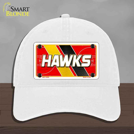 White cap with a red and yellow 'HAWKS' license plate design on a gray background