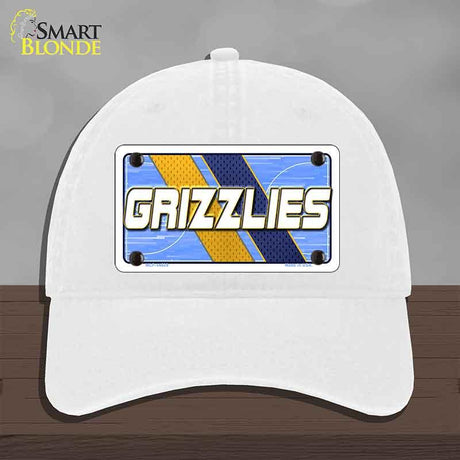 White cap with 'GRIZZLIES' logo on a gray background