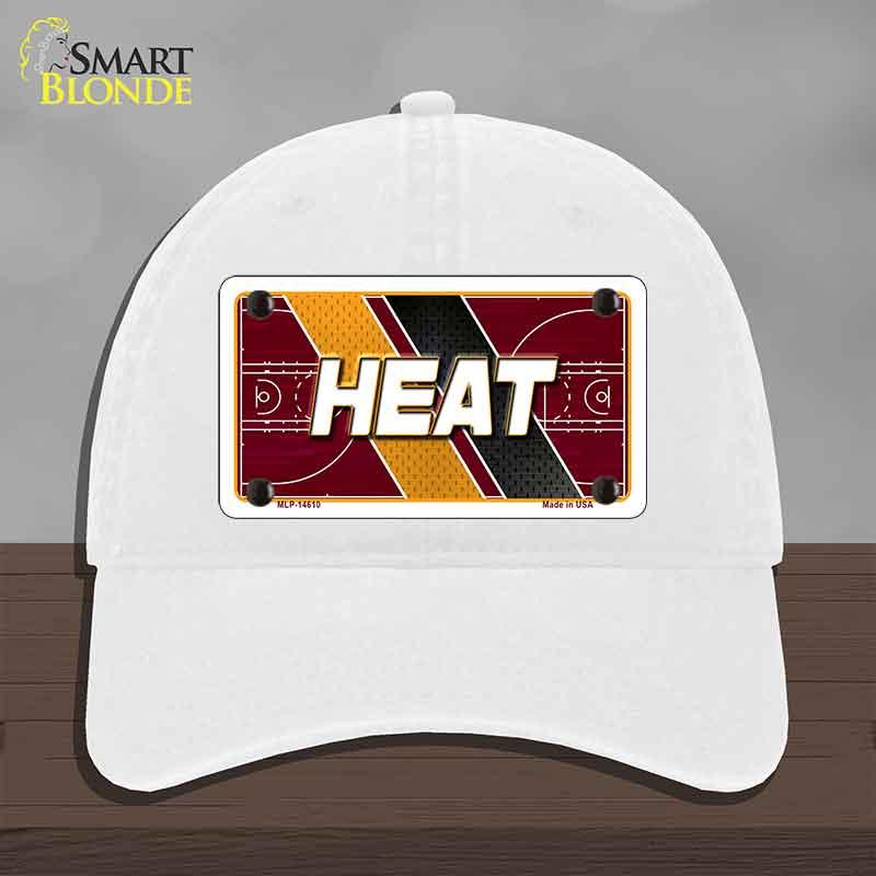 White cap with 'HEAT' design on a gray background