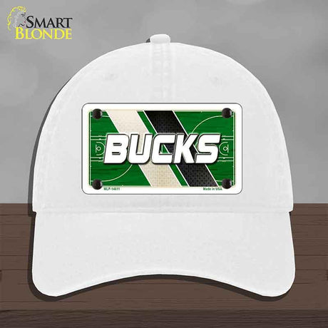 White cap with a 'Bucks' design on a gray background