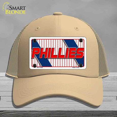 Beige trucker cap with Phillies logo on a gray background