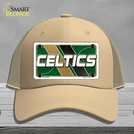 Beige cap with Celtics logo on a gray background