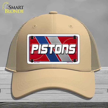 Beige cap with 'PISTONS' logo on a gray background