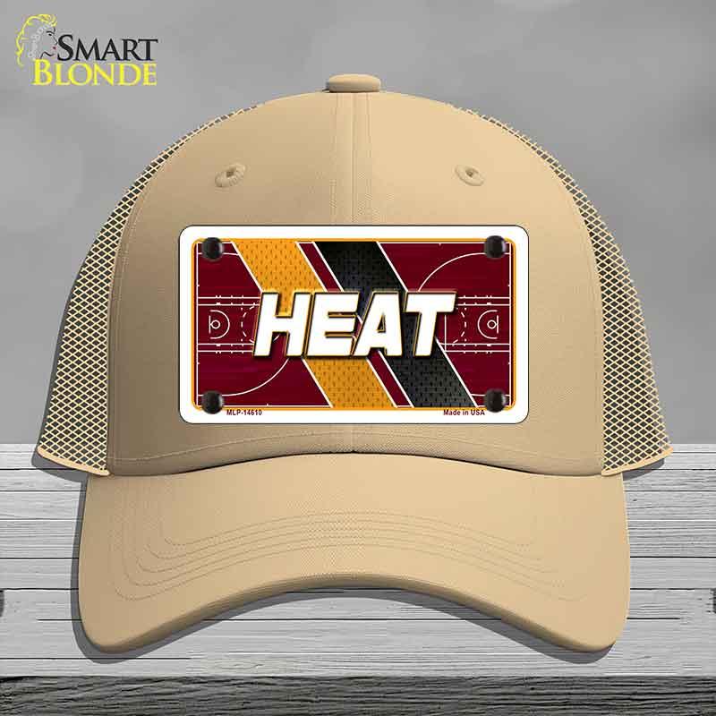 Beige cap with 'HEAT' design on a gray background