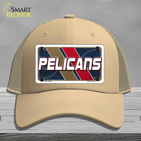 Beige cap with a 'Pelicans' logo on a gray background