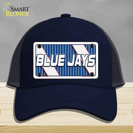 Navy blue cap with 'Blue Jays' logo on a gray background
