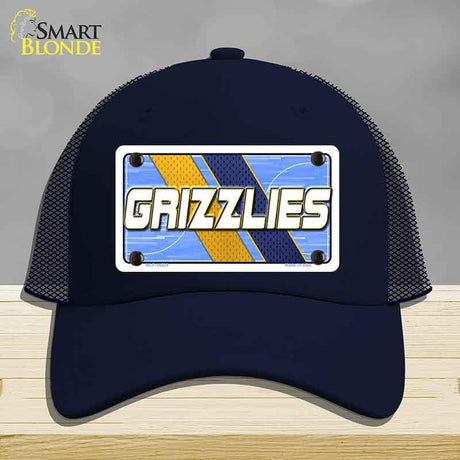 Navy blue cap with 'GRIZZLIES' logo on a gray background