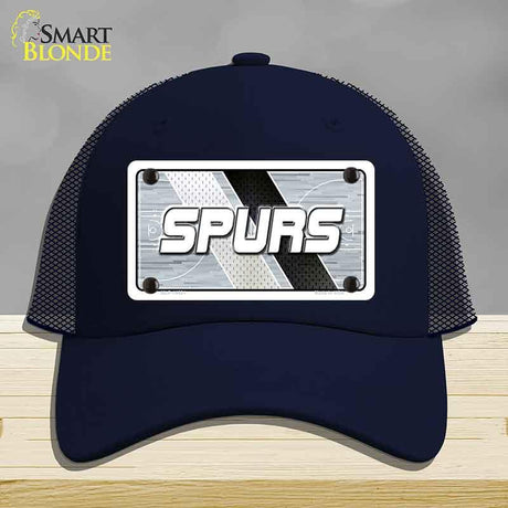 Navy blue cap with 'SPURS' logo on a gray background