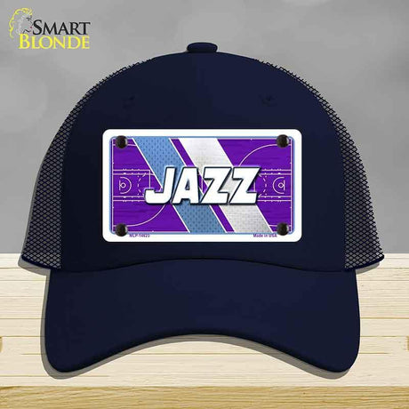 Navy blue cap with 'Jazz' design on a gray background