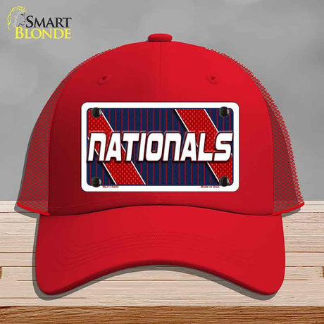 Red cap with 'NATIONALS' design on a gray background