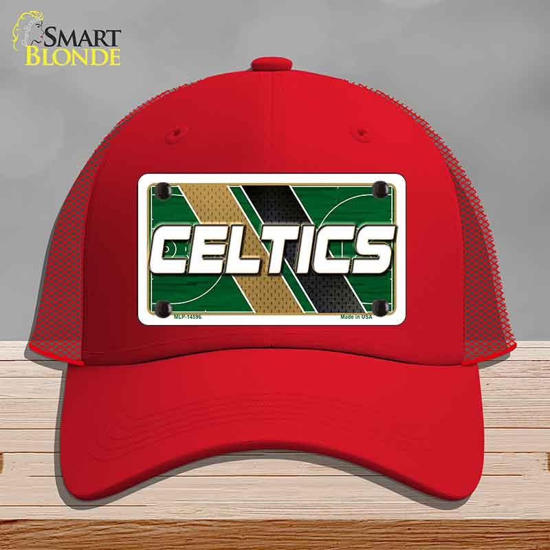 Red cap with Celtics logo on a gray background