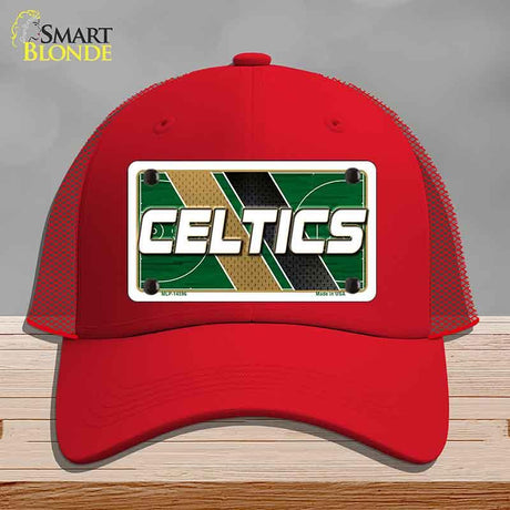 Red cap with Celtics logo on a gray background