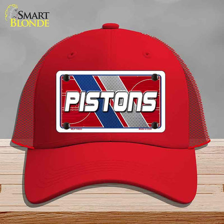 Red cap with 'PISTONS' logo on a gray background