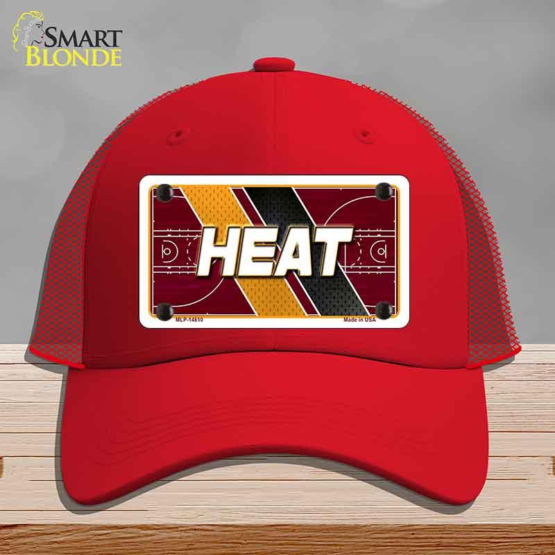 Red cap with 'HEAT' design on a gray background