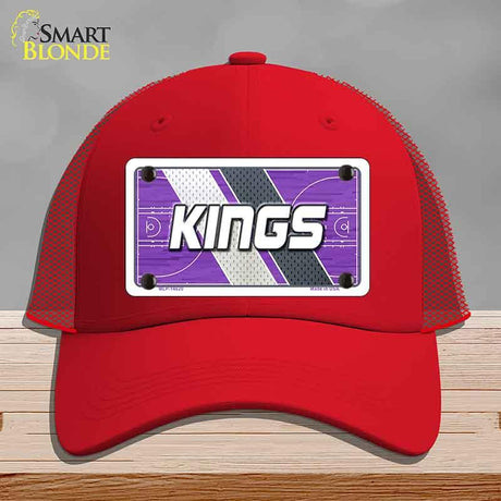 Red cap with a 'KINGS' logo on a gray background