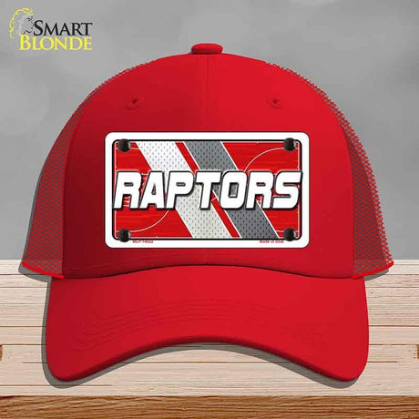 Red cap with 'RAPTORS' logo on a gray background