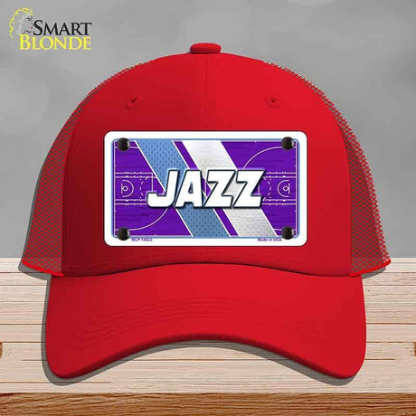 Red cap with 'Jazz' design on a gray background