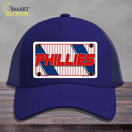 Blue cap with Phillies logo on a gray background