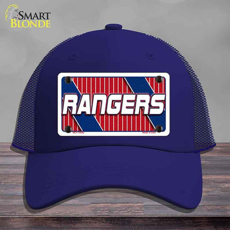 Blue cap with 'Rangers' logo on a wooden surface