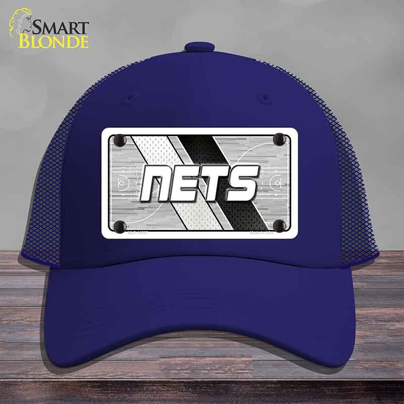Blue cap with 'NETS' logo on a gray background
