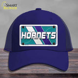 Blue cap with 'Hornets' logo on a gray background