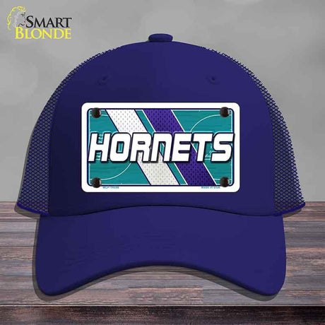 Blue cap with 'Hornets' logo on a gray background