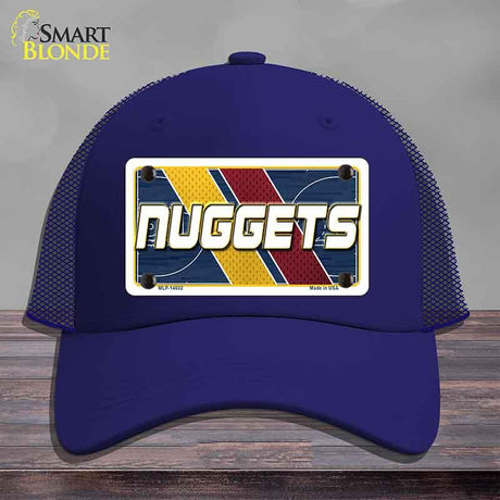 Blue cap with 'NUGGETS' design on a gray background