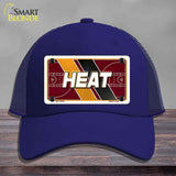 Blue cap with 'HEAT' design on a gray background
