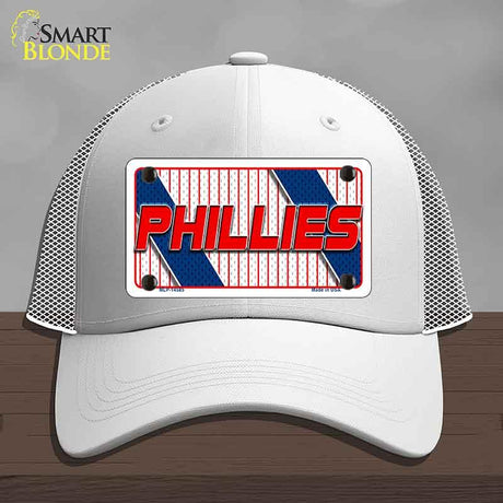 White mesh cap with Phillies logo on a gray background