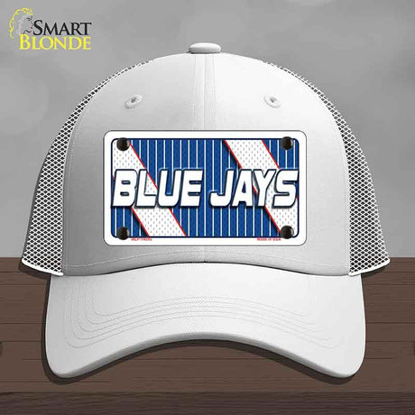 White cap with 'Blue Jays' license plate design on a gray background
