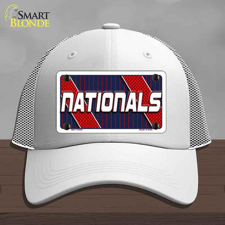 White cap with 'NATIONALS' license plate design on a gray background