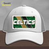 White cap with Celtics logo on a gray background
