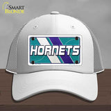 White cap with 'Hornets' design on a gray background